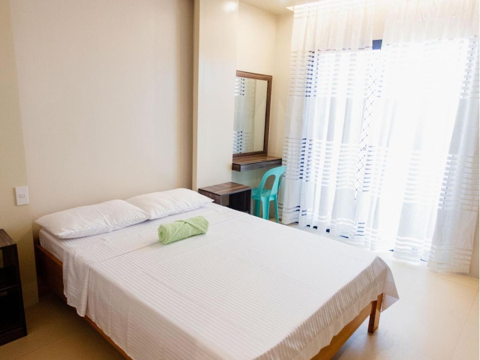 Arc Homes Hotel Panglao Powered By Cocotel Quarto foto