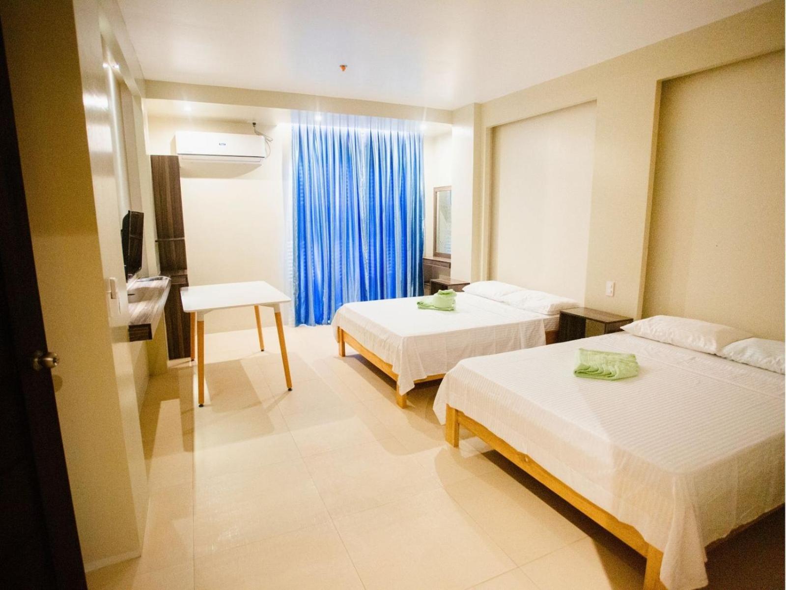 Arc Homes Hotel Panglao Powered By Cocotel Quarto foto