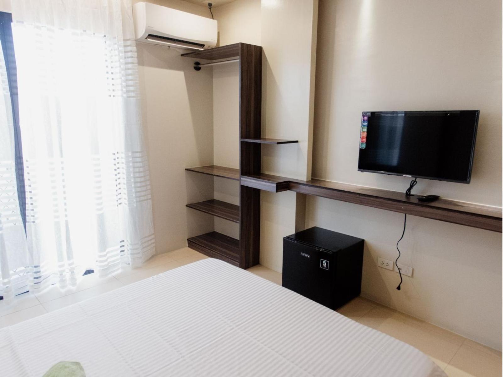 Arc Homes Hotel Panglao Powered By Cocotel Quarto foto