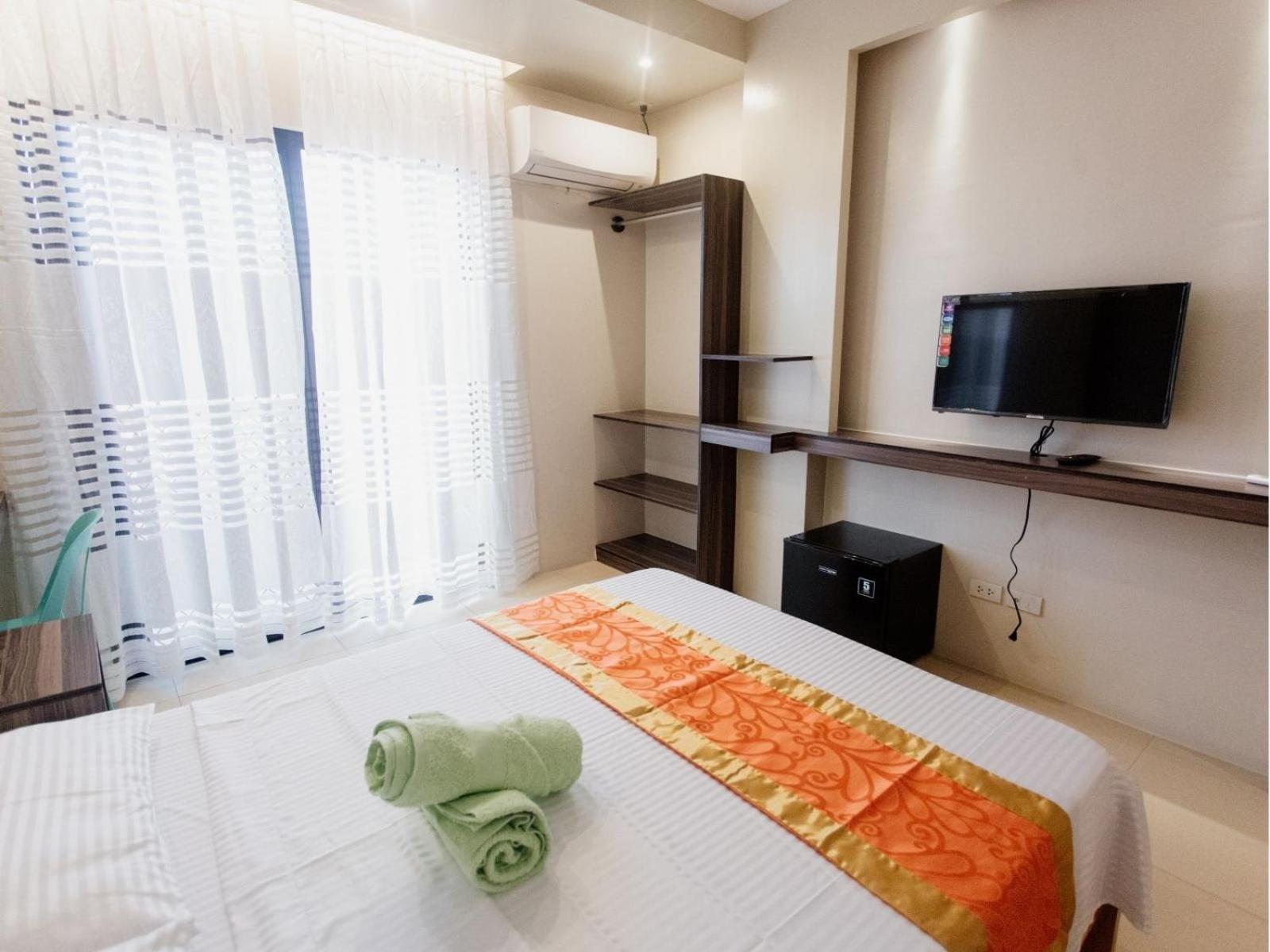 Arc Homes Hotel Panglao Powered By Cocotel Quarto foto