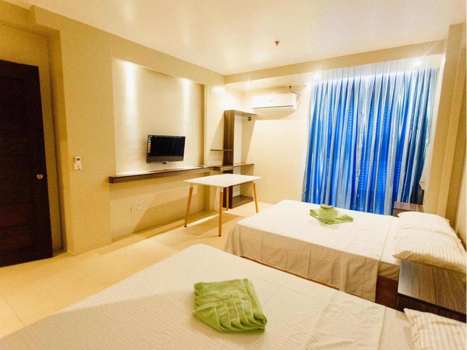 Arc Homes Hotel Panglao Powered By Cocotel Quarto foto