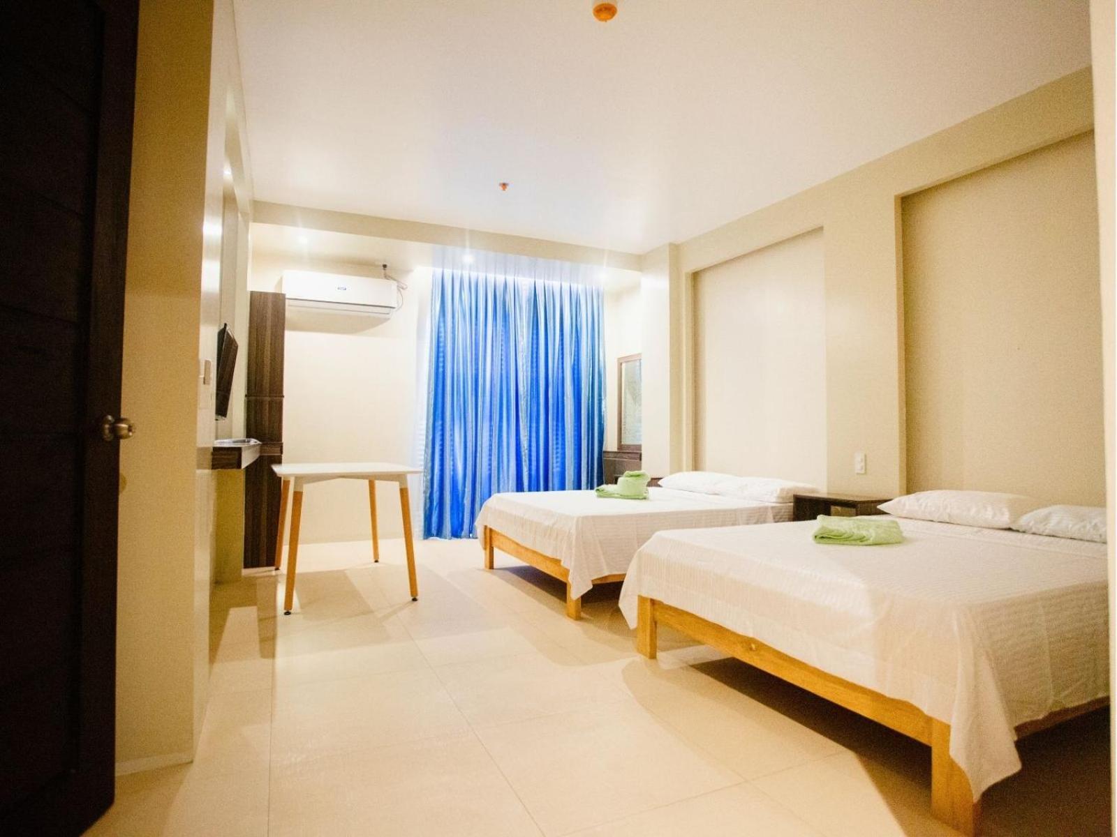 Arc Homes Hotel Panglao Powered By Cocotel Quarto foto