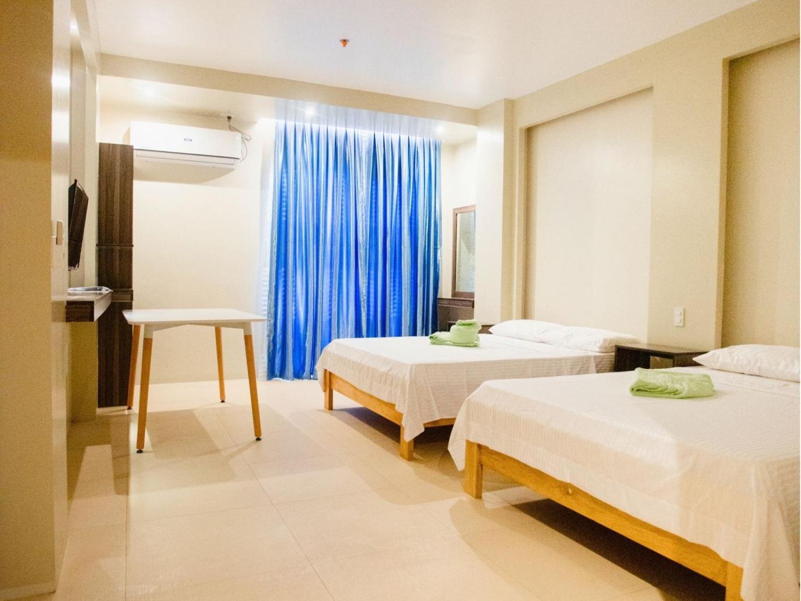 Arc Homes Hotel Panglao Powered By Cocotel Quarto foto